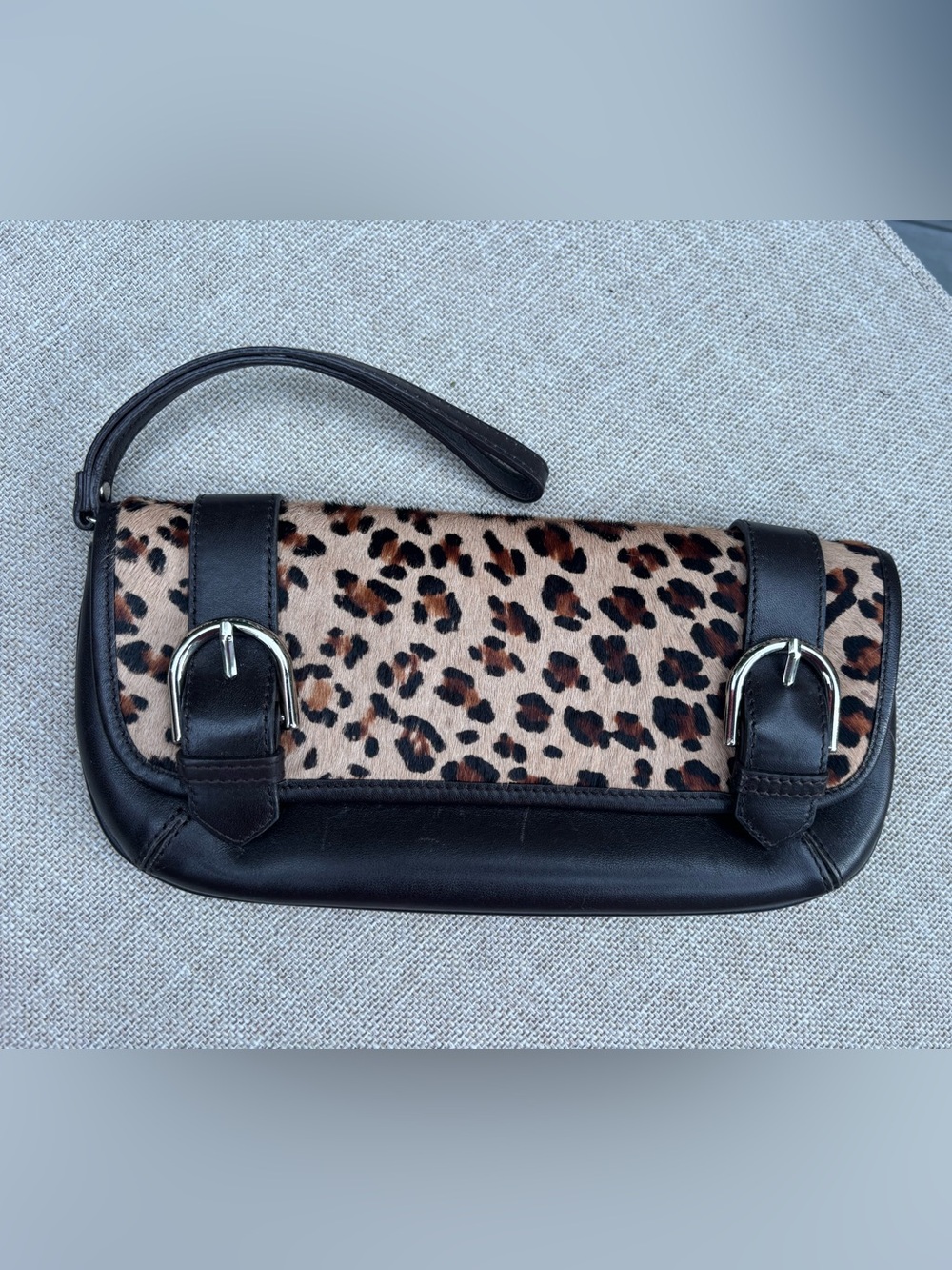 Loft leather fur buckle animal print wristlet clutch